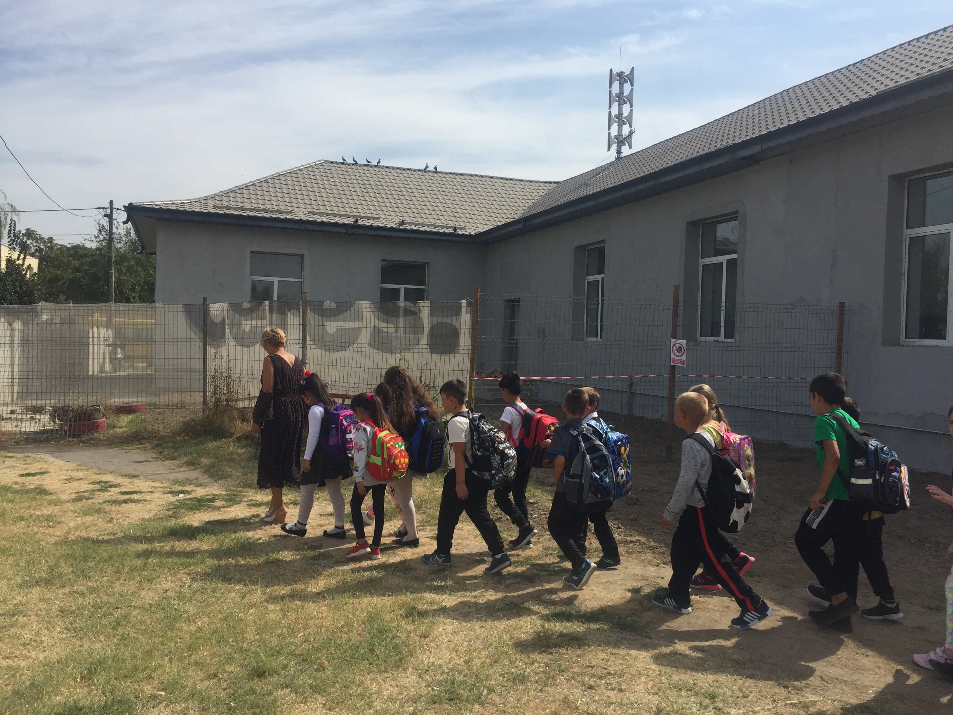 Romanian students on their way to a rural school.
