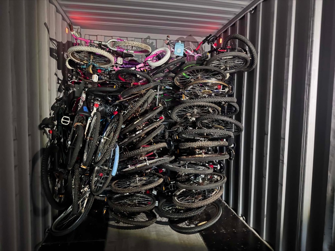 A shipping container packed floor to ceiling with bicycles, ready for freight to Europe.