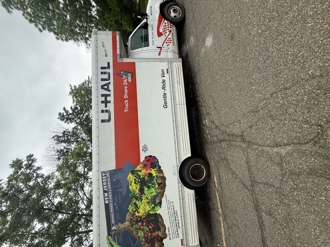 Empty U-Haul truck at the start of bicycle pickup day.