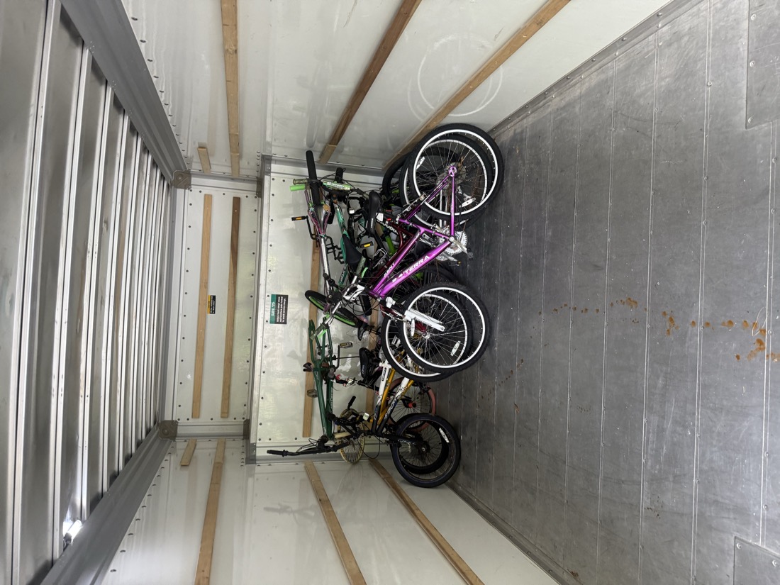 A first small batch of donated bicycles loaded into the truck.