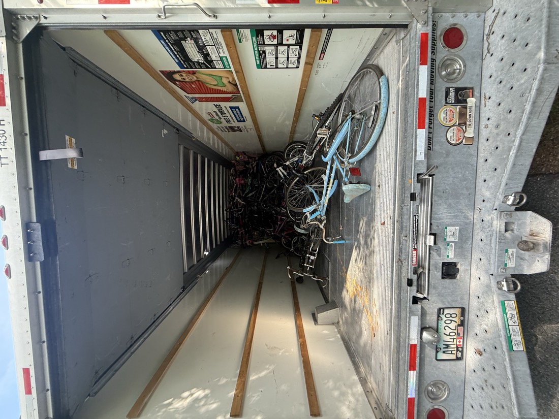 The inside of the U-Haul with bicycles piling up after a few more stops.